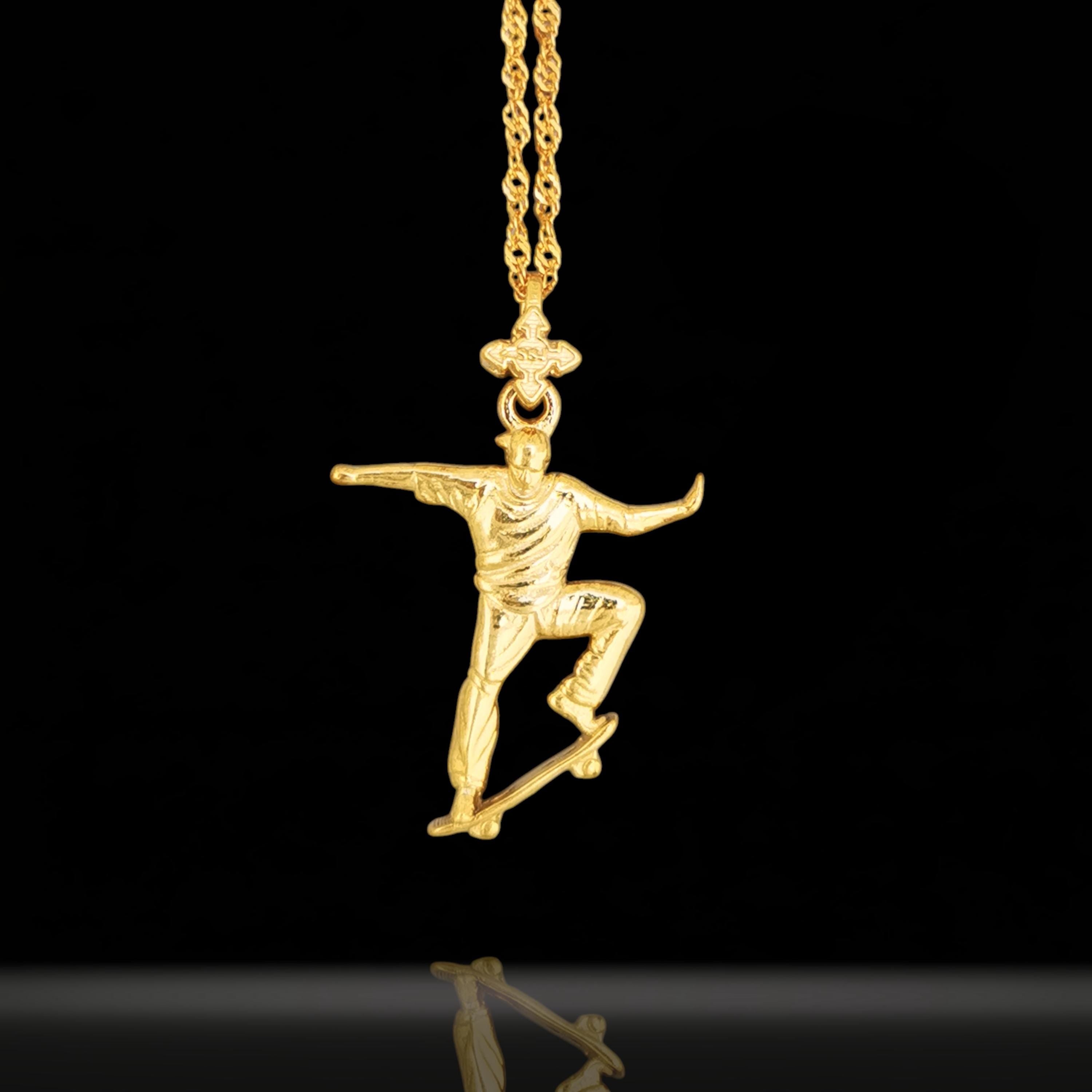 Gold skateboard necklace made from solid 925 sterling silver with polished gold plating – a bold streetwear pendant for skaters, athletes, and urban style lovers. This handcrafted piece captures the fearless spirit of freestyle culture with motion, attitude, and shine.
Featuring a skateboarder mid-trick, this pendant speaks to those who push limits, embrace movement, and lead with confidence. A powerful accessory for anyone who rides hard and lives bold.