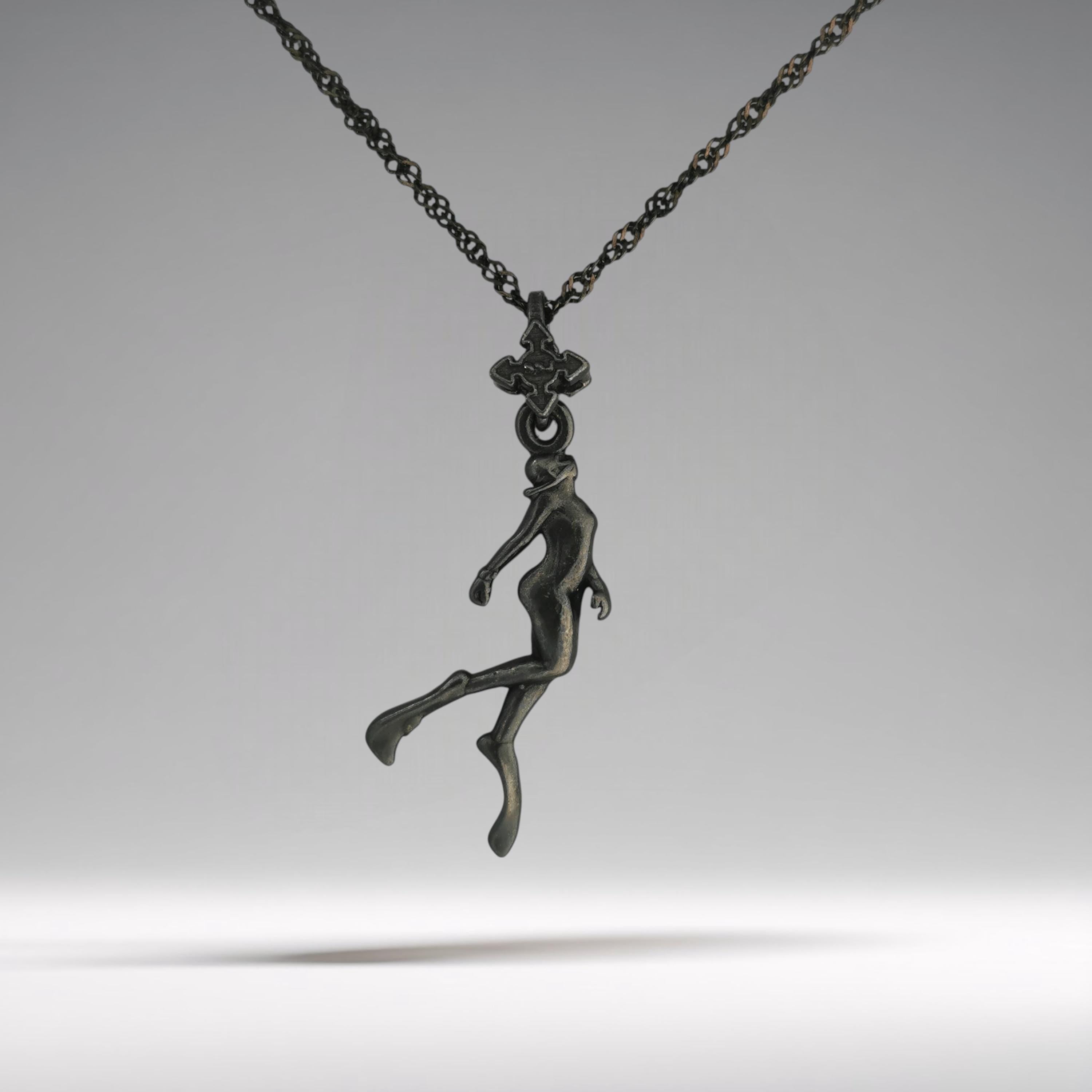 Black oxidized diving necklace for women — a graceful 925 silver pendant honoring the freedom, motion, and beauty of the underwater world.
This sculpted figure of a female diver flows effortlessly, as if suspended in deep silence. Finished in matte oxidized black, it highlights every curve with striking depth and contrast. A poetic piece that symbolizes strength, serenity, and a fearless love of the sea.