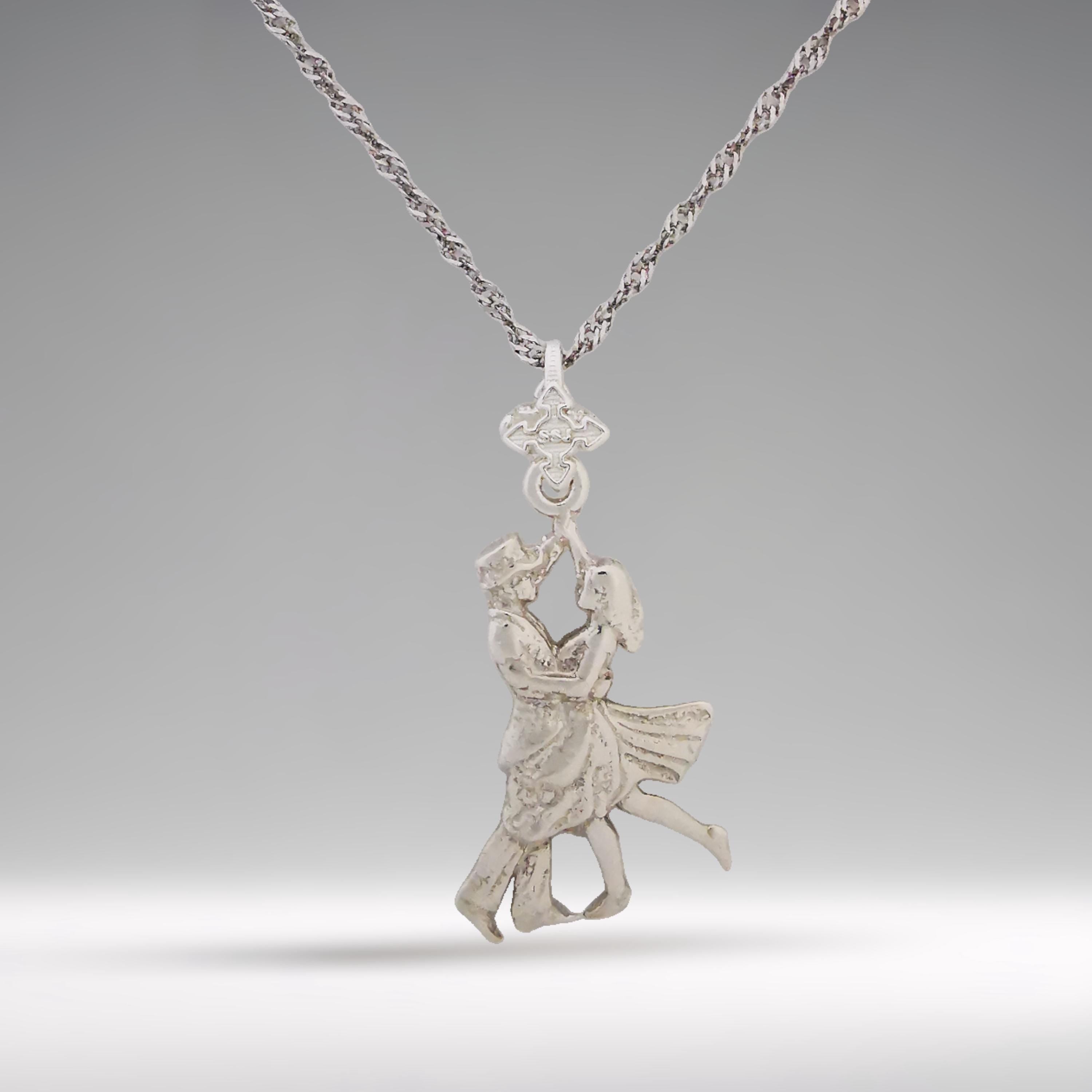 This 925 sterling silver tango necklace captures the grace and emotion of a dancing couple in motion. A romantic piece for women who cherish love, rhythm, and elegance. Whether she's a dancer or simply inspired by the connection of two souls moving as one, this pendant makes a beautiful and meaningful gift.