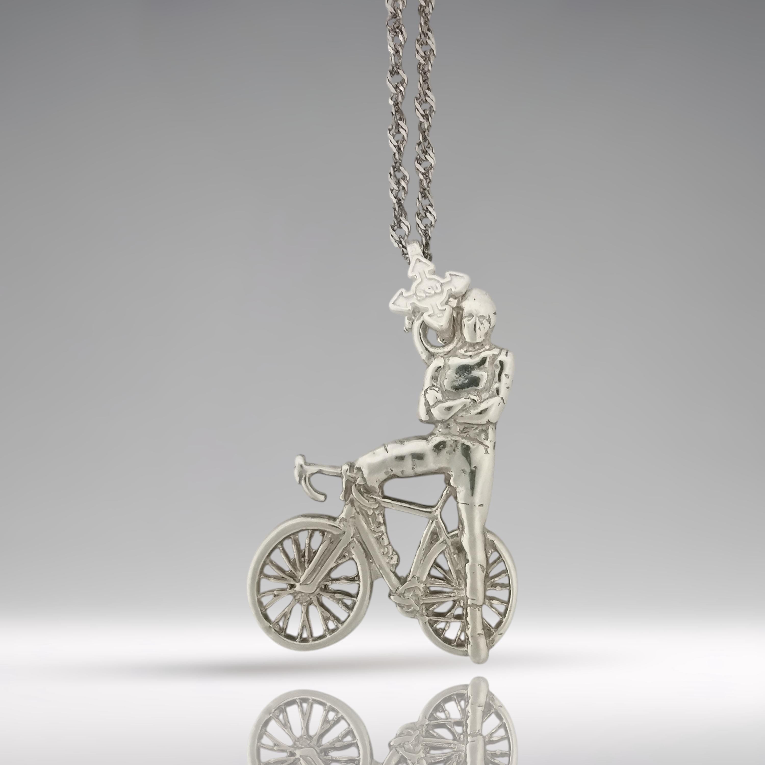Classic cyclist necklace handcrafted from solid 925 sterling silver — a bold pendant capturing the relaxed strength and style of a modern rider.
The design features a male cyclist confidently posed against his bike, arms folded with pride — a statement of endurance, self-discipline, and athletic drive. Cast in polished classic silver, this piece radiates energy, identity, and timeless masculinity.
