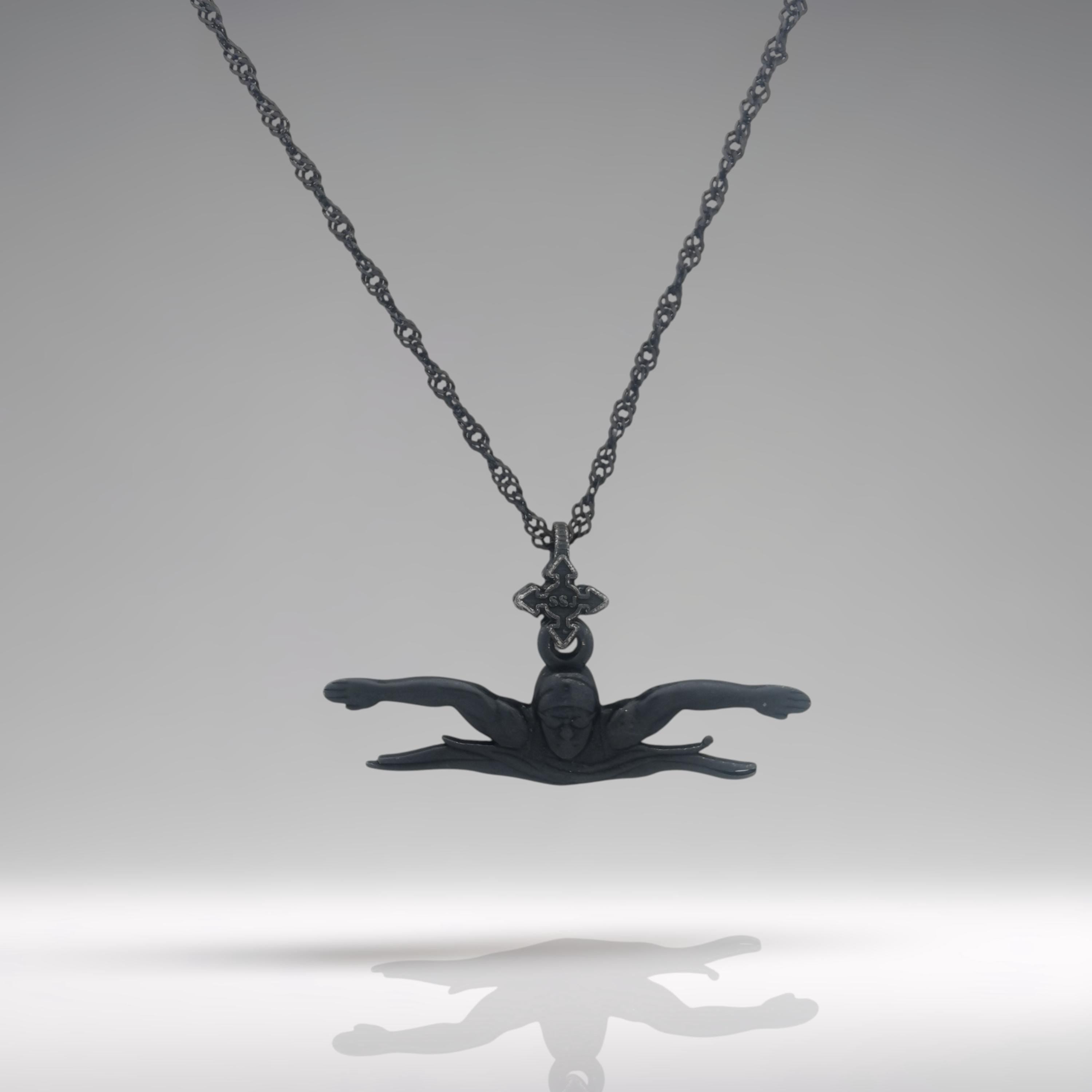 Oxidized black butterfly swimming necklace handcrafted from solid 925 sterling silver — a bold and powerful pendant for men and teen boys who thrive in water.
This dynamic design captures the essence of the butterfly stroke: strong, focused, and fluid. With a rugged matte black finish, the pendant embodies endurance and determination — perfect for swimmers who lead with strength and confidence. A striking gift for milestones, sports events, or personal victories.