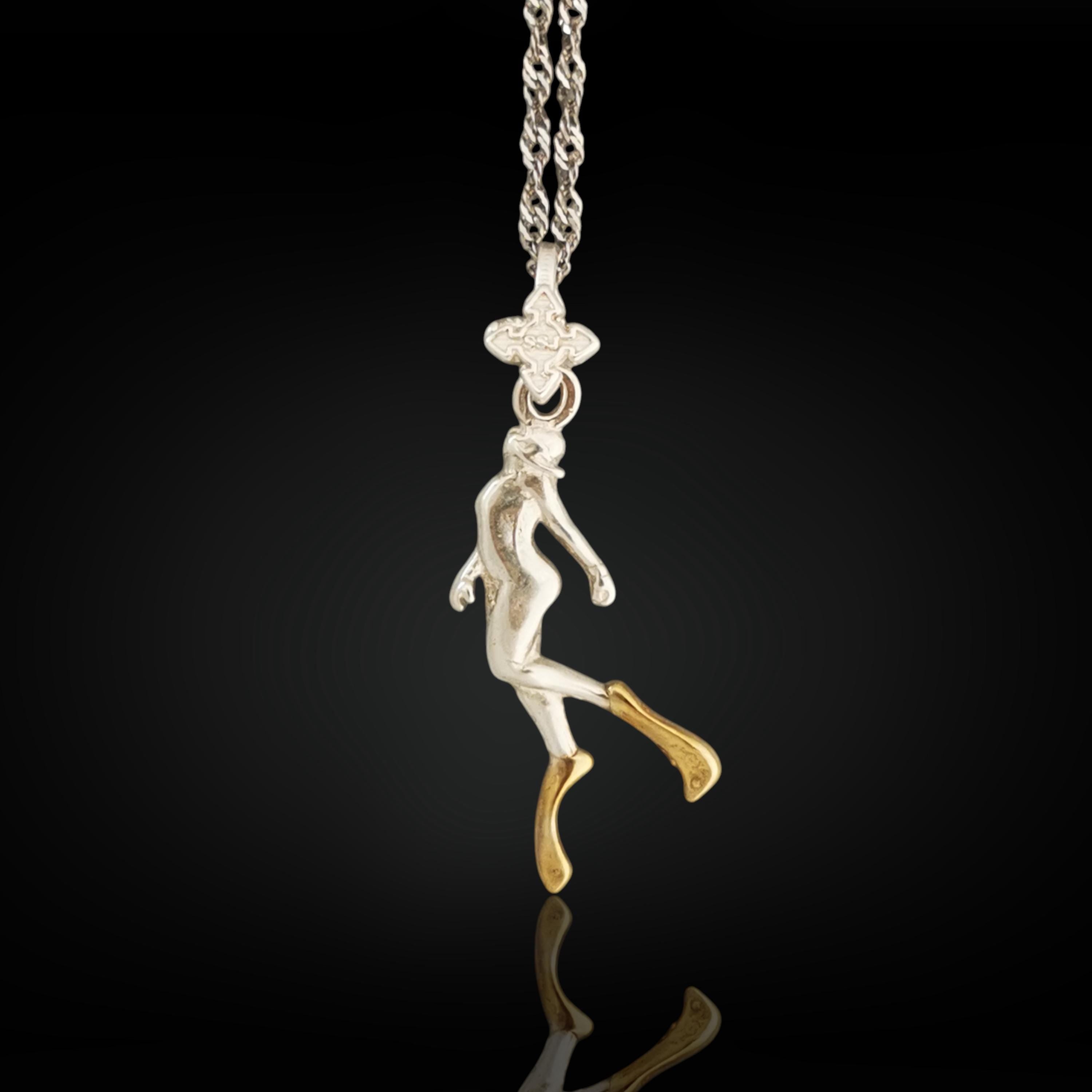 Two-tone diving necklace for women — a symbolic pendant blending silver and gold to honor elegance, strength, and love for the ocean.
This graceful diver design is sculpted in solid 925 sterling silver and accented with radiant partial gold plating. The flowing motion of the figure evokes serenity, movement, and depth — a meaningful piece for those who feel at home in the water.
