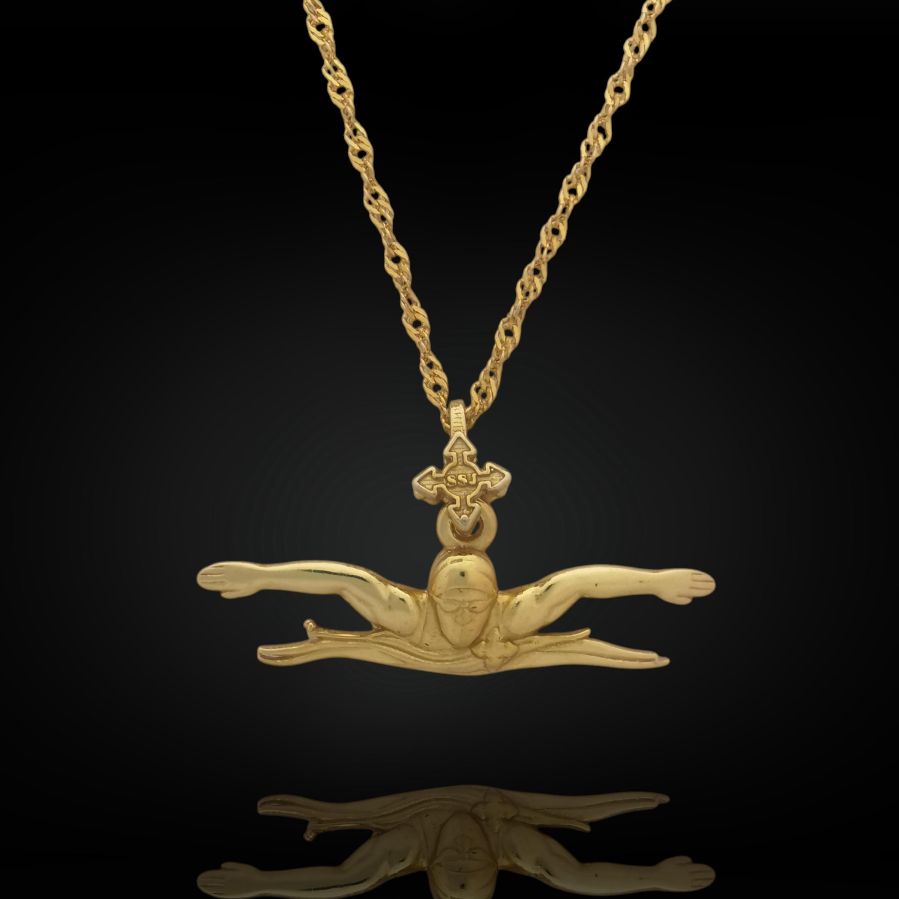 Gold-plated butterfly swim necklace crafted from solid 925 sterling silver — a bold and dynamic pendant capturing the strength and precision of competitive swimming.
This handcrafted piece depicts a male swimmer mid-butterfly stroke, symbolizing endurance, technique, and discipline. Ideal for those who thrive in water and live for speed, motion, and focus. Perfect for men and teen boys who swim with power and chase personal victories.