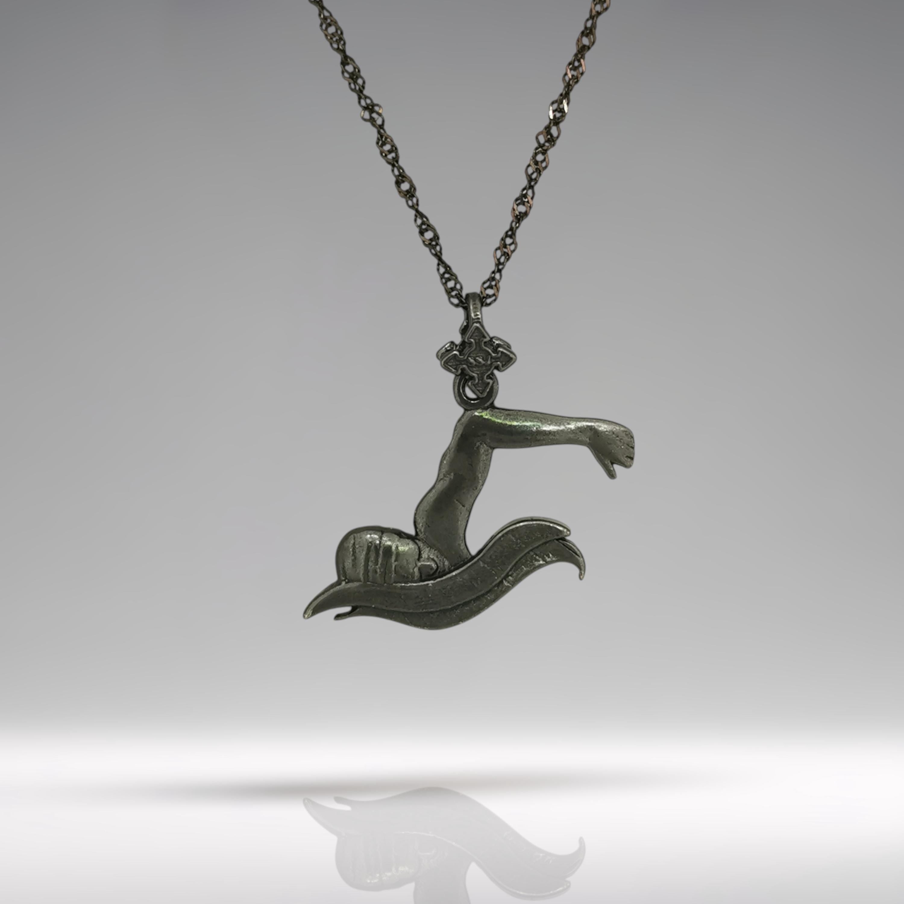 Oxidized black breaststroke necklace crafted from solid 925 sterling silver — a rugged and masculine pendant designed for male swimmers, teen athletes, and boys who train with intensity.
The sculpted design captures a swimmer mid-stroke in the breaststroke technique — focused, powerful, and cutting through water. The matte black finish adds edge and confidence, making it the perfect piece for those who thrive in the pool and compete with purpose.