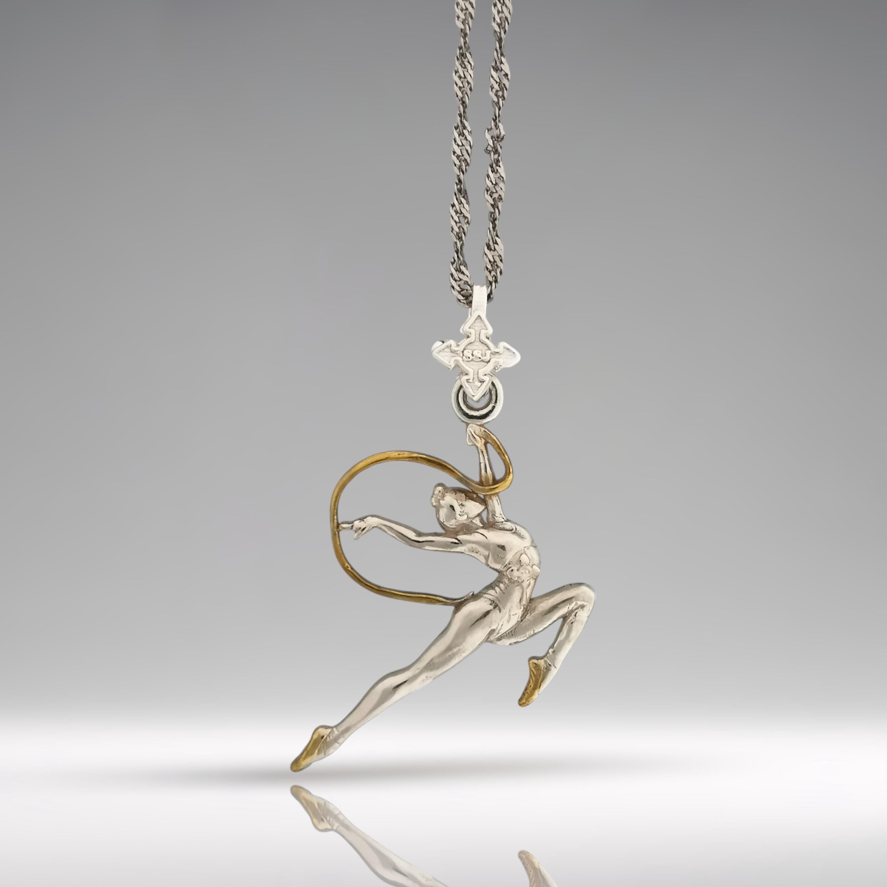 Rhythmic gymnastics pendant in 925 silver with partial gold plating – premium handcrafted jewelry for girls who move with elegance, confidence, and artistry.
🎁 Perfect gift for:
• Rhythmic gymnasts, fans, coaches
• Girls, teen athletes, dancers
• Sport achievements, motivation, birthdays