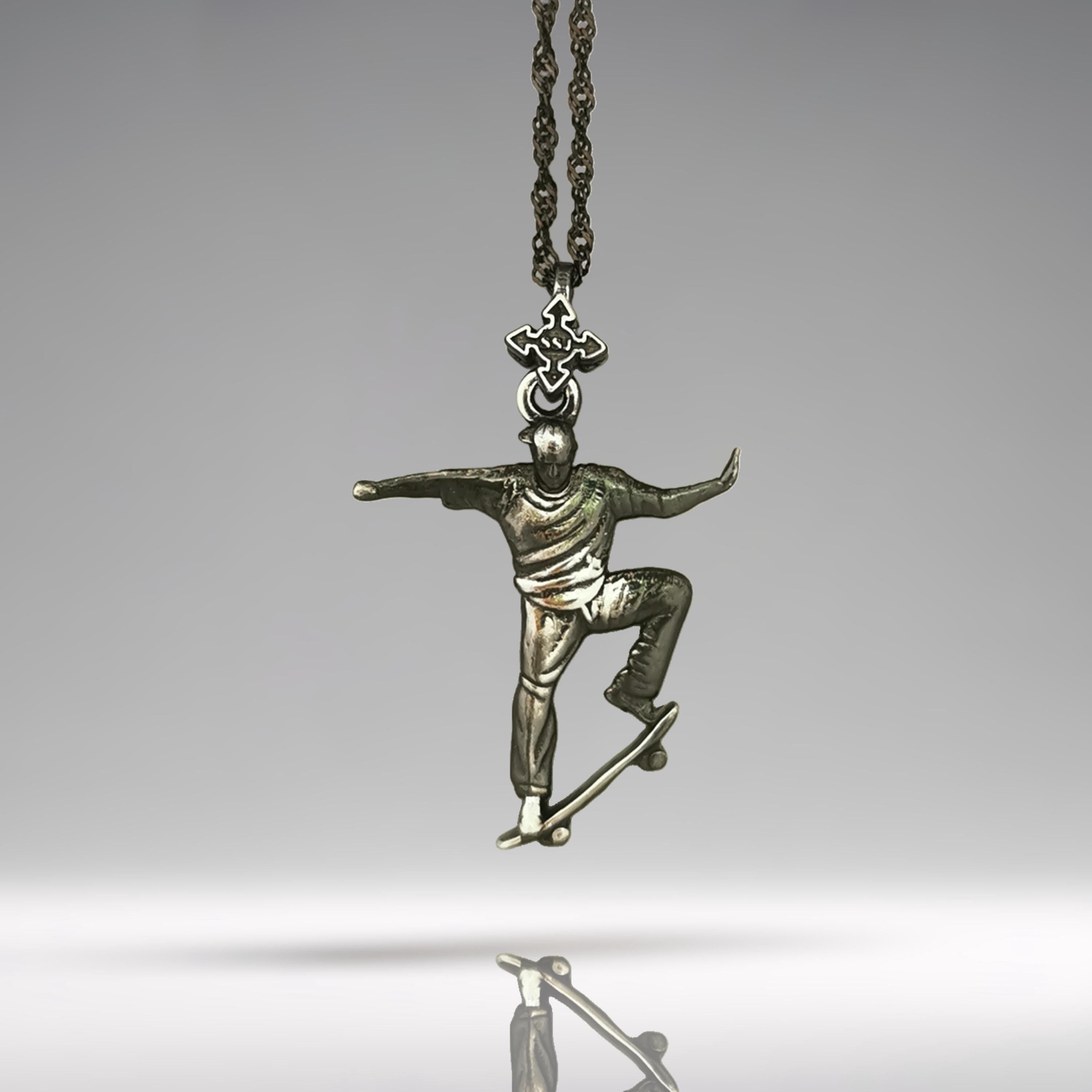 Vintage style skateboard necklace for men made from solid 925 sterling silver with a rugged patinated finish – a bold pendant capturing a skater mid-trick. This handcrafted piece channels urban attitude, freestyle motion, and the fearless energy of street sports.
Designed for skaters who ride hard and express themselves with every move, this piece brings raw power and classic edge in one timeless symbol.