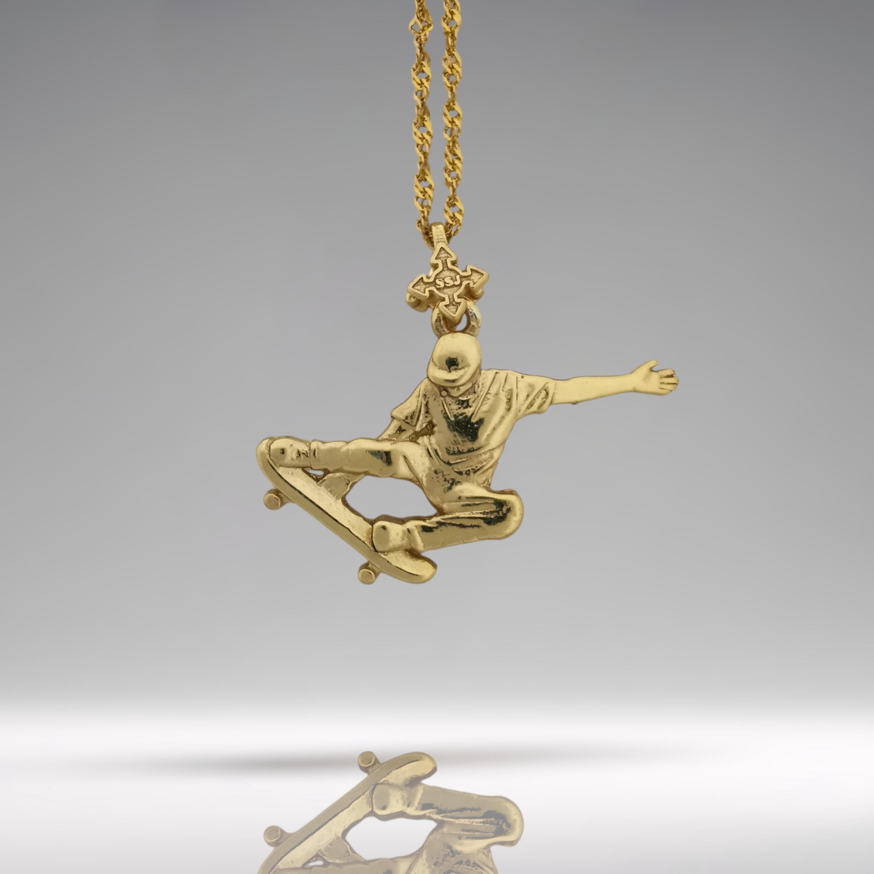 Gold skateboard necklace made from solid 925 sterling silver with a polished gold finish – a bold streetwear pendant for skaters, freestyle athletes, and men who ride with fearless energy. Designed for movement and impact, this handcrafted piece channels raw style and dynamic confidence.
Capturing a skateboarder mid-trick, it celebrates individuality, freedom, and the power of motion. Whether for everyday wear or standout moments, this pendant speaks the language of those who push limits.